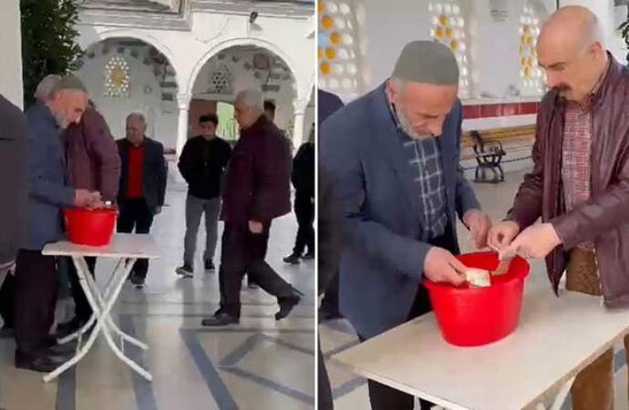 Camide depremzedeler için toplanan bağışı çalmaya çalışırken yakalandı!