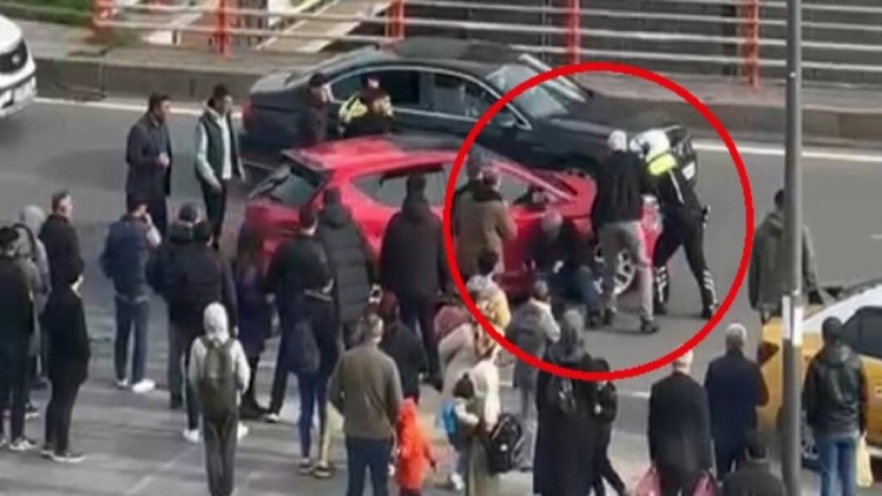 Tartıştığı trafik polislerinin üzerine otomobili sürüp kaçan şahıs, yakalanınca polislere saldırdı
